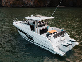 A sleek catamaran docked in tranquil waters, showcasing its modern design and spacious layout, perfect for leisurely outings or group charters.