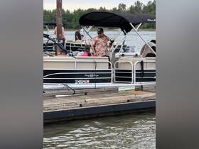 A family enjoys a day on a pontoon boat, with a child and a dog in the mix, creating a fun and memorable boating experience.