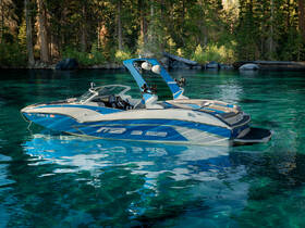 A sleek speedboat anchored in crystal-clear waters, surrounded by lush greenery — perfect for summer adventures on the lake.