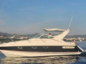 A sleek Fairline yacht cruising through calm waters, showcasing its elegant design and perfect for luxury outings on the sea.
