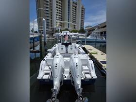 A sleek speedboat docked at the marina, showcasing powerful twin engines and a stylish design, perfect for thrilling water adventures.