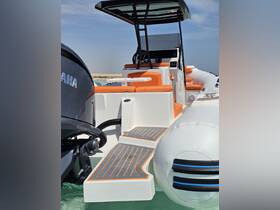 A detailed view of the interior helm and seating area of a sleek boat, showcasing modern design and comfort features ideal for a day on the water.