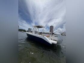 A sleek speedboat with a Yamaha engine, captured at the dock under a bright sky — perfect for fishing or leisure outings on the water.