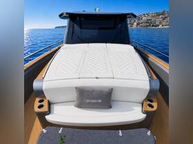 A stylish interior view of the 'Sea Force One' boat, showcasing luxurious seating and a serene atmosphere perfect for relaxation on the water.