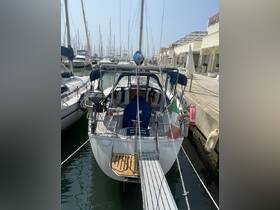 A well-maintained yacht docked at the marina, showcasing its sleek design and inviting atmosphere — perfect for a day on the water.