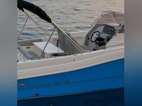 A detailed view of a center console boat named 'Atlantic Marine' showcasing its sleek design and features, perfect for a day on the water.