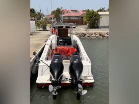 A sleek speedboat docked at the marina, showcasing its powerful twin engines and safety gear, perfect for thrilling water adventures.