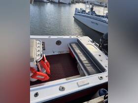 Interior view of a boat showcasing seating and safety equipment, ideal for comfortable outings on the water.