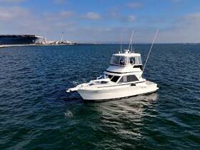 A sleek yacht cruising through the water, showcasing its elegant design and perfect for luxury outings on the sea.