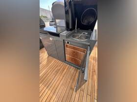 A detailed view of the interior console area of a boat, showcasing modern design elements and functional features, perfect for enhancing onboard experiences.