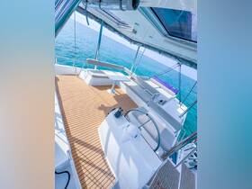A spacious interior view of a yacht's helm and seating area, showcasing a modern design and inviting atmosphere for relaxation on the water.