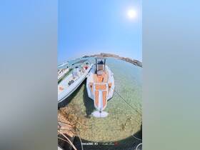Aerial view of a sleek speedboat docked at a marina, showcasing its stylish design and inviting atmosphere for water adventures.