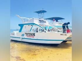 The TITAN Boat Party is docked on a sunny day, showcasing its vibrant design and inviting atmosphere for fun on the water.