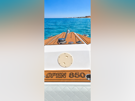 A stunning view of the bow of an Open 850 boat, showcasing its sleek design against the vibrant blue waters — perfect for a day of adventure on the sea.