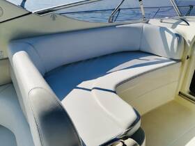 A cozy seating area inside a boat, perfect for relaxing and enjoying the views while cruising on the water.