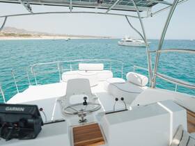 A well-equipped helm area showcasing comfortable seating and navigation console, perfect for enjoying a day on the water.