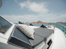 A cozy lounge area on a yacht, featuring comfortable cushions and a scenic view of the ocean — perfect for relaxation while cruising.
