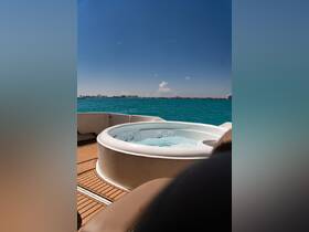 A luxurious jacuzzi on the deck of a boat, perfect for relaxing while enjoying stunning ocean views. Ideal for those seeking comfort and leisure on the water.