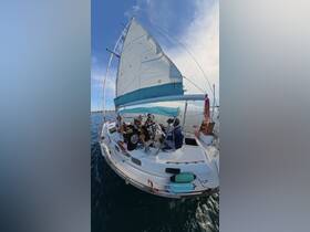 A lively group enjoys a sailing adventure on a boat, capturing the essence of fun and camaraderie on the open water.