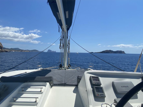 View from the helm of a catamaran, showcasing the console and surrounding waters — perfect for navigating the beautiful coastline.