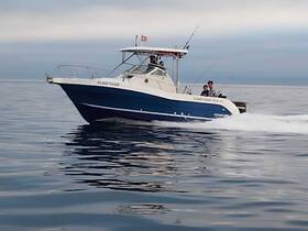 A family enjoys a fishing trip aboard the 'Island Fisher,' cruising through calm waters — perfect for creating lasting memories on the sea.