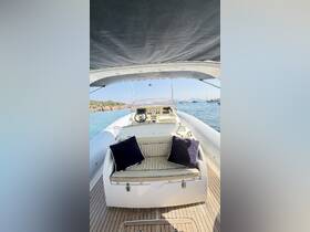 A well-appointed helm area featuring comfortable seating and a clear view of the serene waters, perfect for navigating your next adventure.