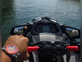 A thrilling view from the handlebars of a jet ski, showcasing the excitement of on-water adventures. Perfect for adrenaline seekers looking to explore the waterways.