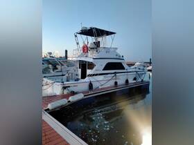 A sleek yacht docked at the marina, showcasing its elegant design and structure, perfect for luxury outings on the water.
