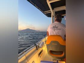 A view from the helm of a charter boat, showcasing the captain navigating through scenic waters at sunset, perfect for a relaxing boating experience.