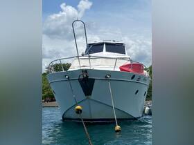 A striking view of a boat anchored in calm waters, showcasing its sleek design and inviting atmosphere — perfect for leisurely outings.