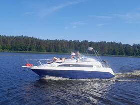Two friends enjoy a sunny day on a boat, relaxing and taking in the beautiful scenery — a perfect summer getaway on the water.
