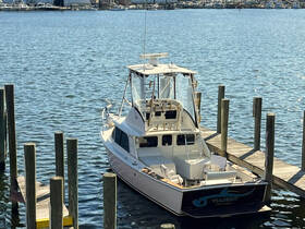 A well-maintained yacht docked at the marina, showcasing its sleek design and inviting atmosphere for future adventures on the water.