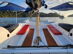 Interior view of a catamaran showcasing comfortable seating and lounge areas, perfect for relaxing while enjoying the scenic waters.