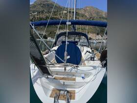A detailed view of the interior helm area of a yacht, showcasing the sleek design and functional layout, perfect for navigating the open waters.