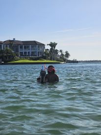 A couple enjoys snorkeling in clear waters, showcasing a fun and adventurous day on the water — perfect for aquatic exploration and memorable experiences.