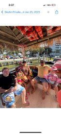 A joyful family enjoys their time aboard a boat, showcasing a fun day out on the water with kids and vibrant surroundings.