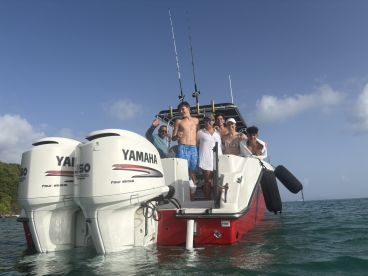 A lively group of friends celebrates aboard a boat, enjoying their time on the water — perfect for unforgettable adventures and gatherings.
