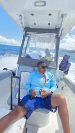Guests enjoy a relaxing boat ride, capturing the essence of adventure and leisure on the water.